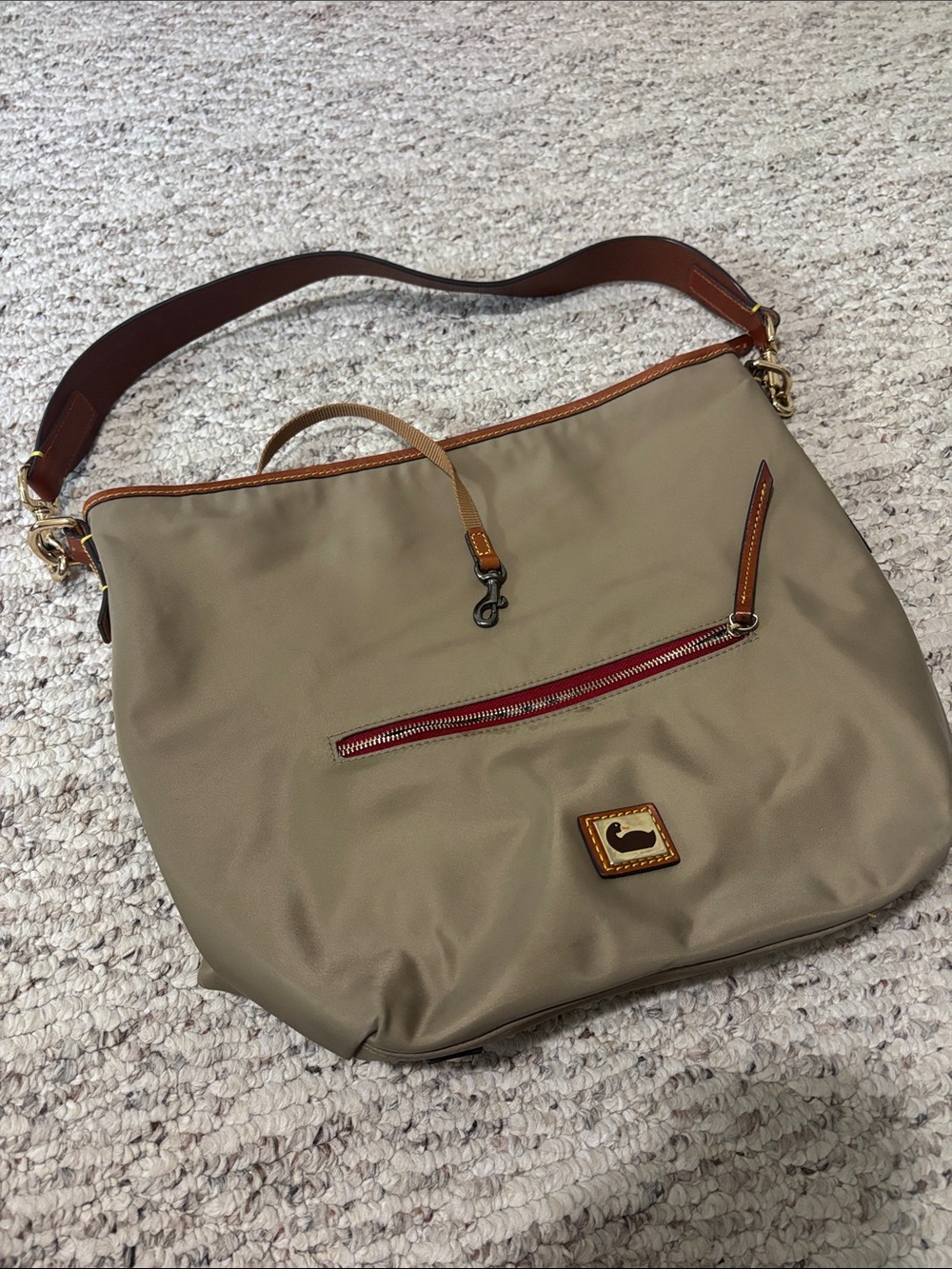 Dooney & Bourke Beige Nylon Shoulder Bag with Tan Trim and Red Accent